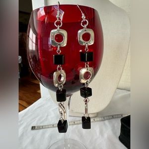 Long abstract silvertone open square black bead earrings